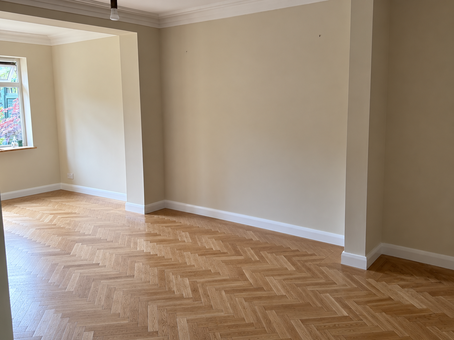 Finished room with fresh walls and crisp white skirting